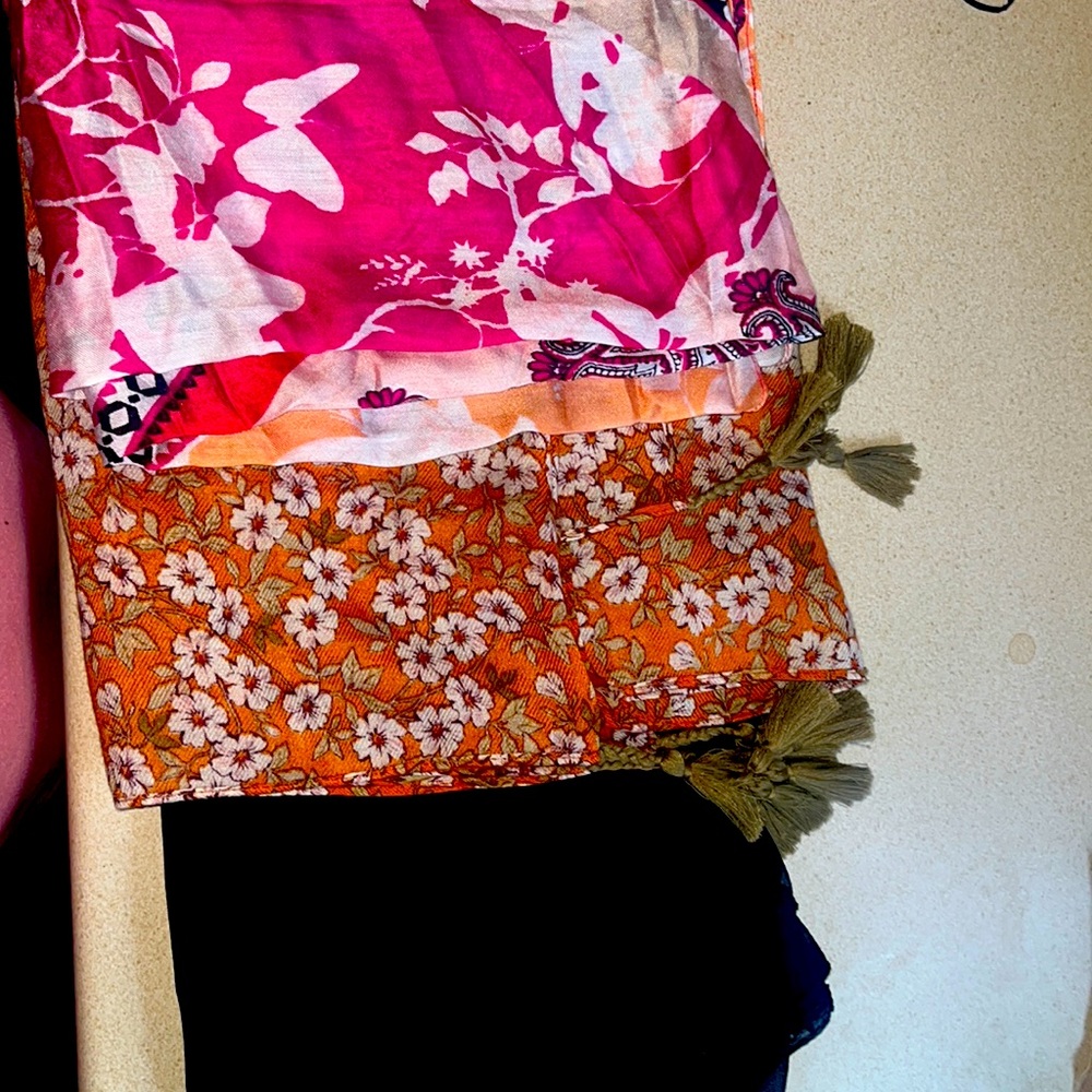 Three scarves or shoulder covers